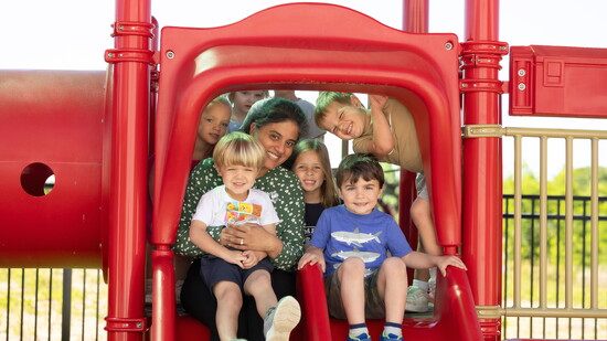 Seena Parikh with children at the Primrose School of Forest Hill. Photo Credit: Kerry Paradis Photography