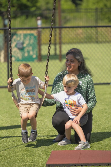Seena Parikh with children at the Primrose School of Forest Hill. Photo Credit: Kerry Paradis Photography
