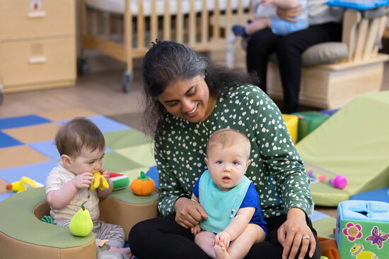 Seena Parikh with children at the Primrose School of Forest Hill. Photo Credit: Kerry Paradis Photography