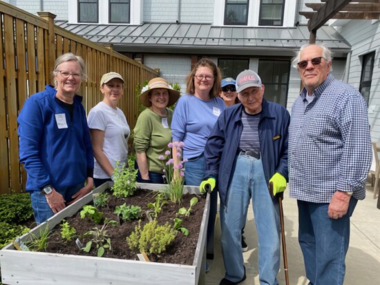 WGC Volunteers planting an herb garden at The Residence.