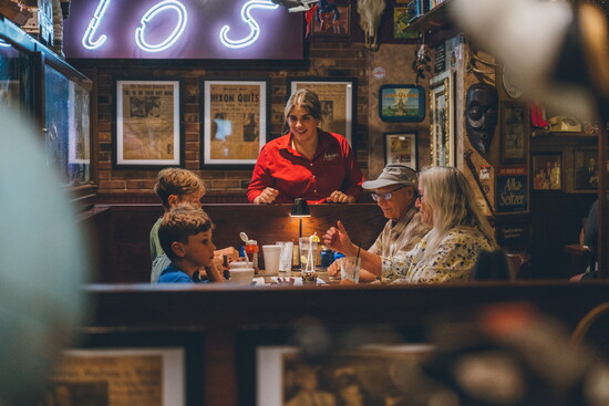 Dinner service inside Antonio's Restaurant in Simsbury