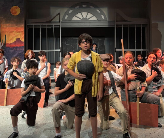 Cast members from Newsies bring high‑energy choreography and heartfelt storytelling to the Citadel Theatre stage.