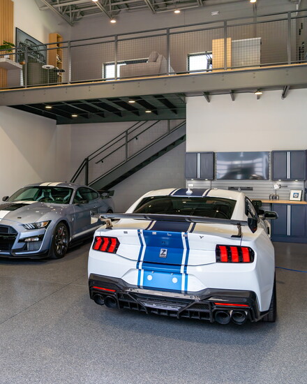American muscle cars greet visitors to the display condo at RallyPoint.
