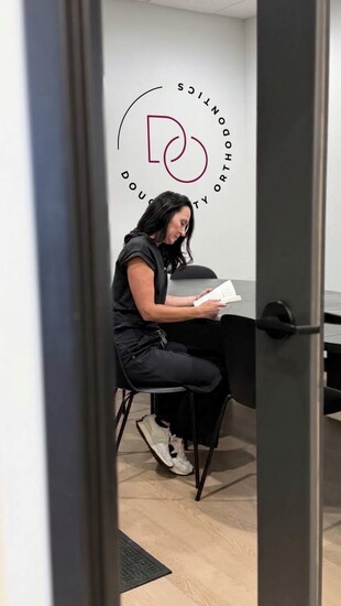 Dr. Dougherty reads on her breaks