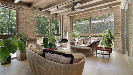 SUNROOM ADDITION Adds home value; accessible way to bring the outdoors in with protection from the elements