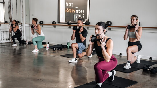 Group strength class at Mōtiv Fitness.