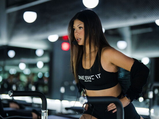 Group pilates class at ONESWEAT.