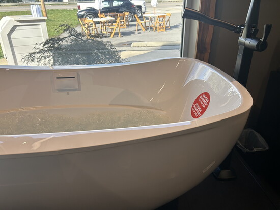 This gorgeous tub features a heated backrest. 