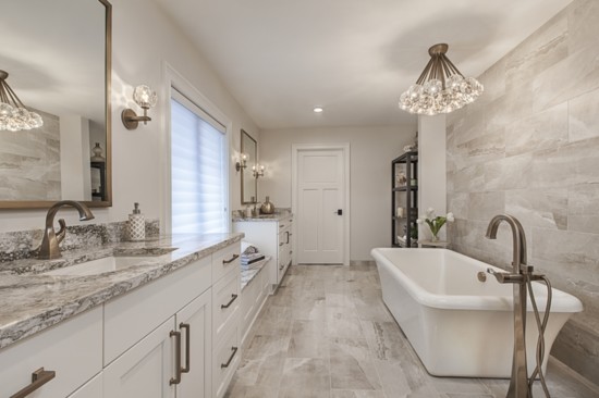 People spend plenty of time in bathrooms, so they need to be clean and fresh. Photo courtesy of Authentic Kitchen & Design and Jeff Garland Photography.