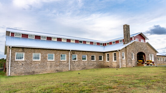 The newly-renovated Comer Barn shines brightly once again on Nashville Pike.