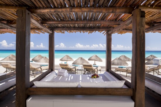 Relax in one of the many beachside cabanas