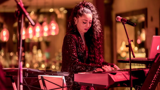 Checking the set list, getting ready to perform.