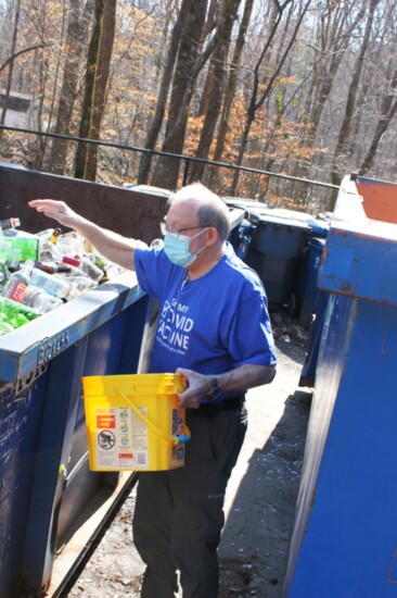 Jorgen Brandt-Nielson brings bottles for recycling to the McIntosh Trail Recycling Center in Peachtree City.  