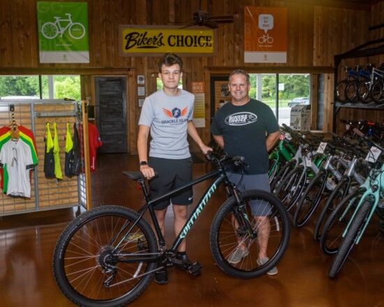 Kaedyn Hinkle purchases his first real bike from David Hardin.