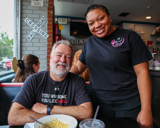 David and his very empty breakfast bowl with Brunch House co-owner Ashley Brown.