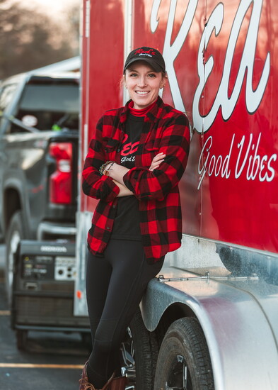 Caitlin McGrath-Levesque in front of Red's Good Vibes food truck