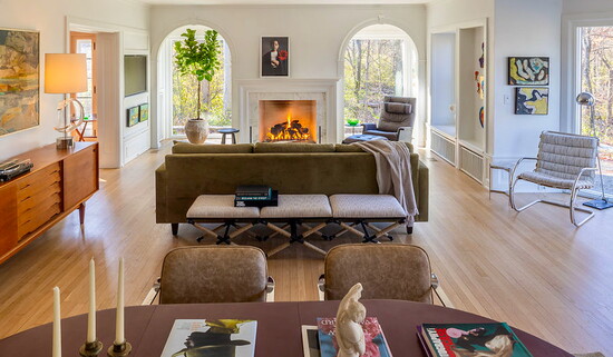 The living room hosts gatherings of all kinds: art shows, panels, intentional discussions & retreats. Photo by Monsta Audio And Video.