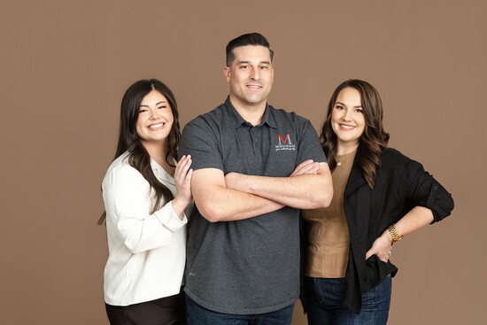 Lucien Mariano (center), with his wife, Lauren (left), and sister Ashton (right), the next generation of Mariano & Co. 