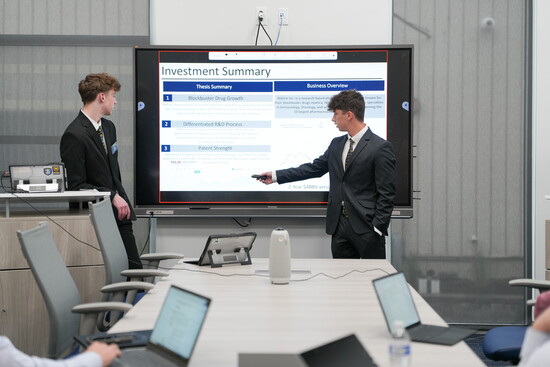 Students present their picks for the investment fund to an advisory board made up of industry leaders. 