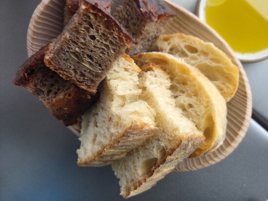 Olive bread and rustic white bread with olive oil. Photo credit: Jennifer Waldera