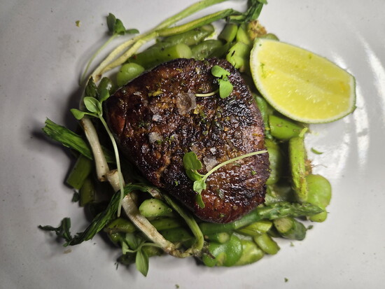 Beef tenderloin with spring vegetables. Photo Credit: Jennifer Waldera