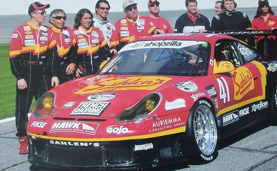 Father and son: Jim Michaelian (second from left) and Bob (third from left) co-drove the 2007 Rolex 24 at Daytona, a 24-hour endurance race.