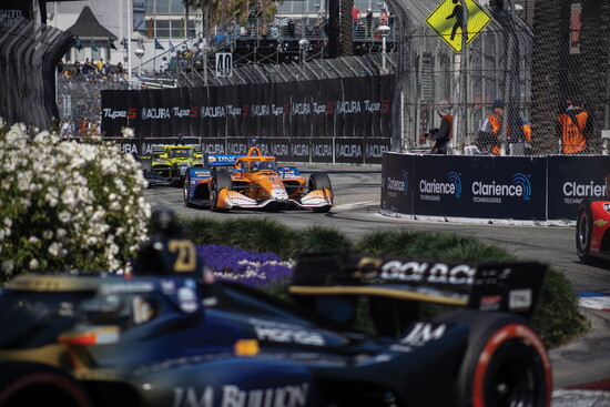 IndyCar drivers speed along the streets of Downtown during the 51st annual Acura Grand Prix of Long Beach Sunday April 19, 2026. Photo by Brandon Richardson.