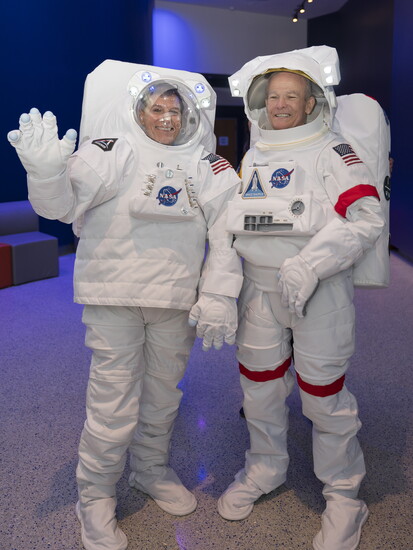 Lowell and Carl Persis greeting students at the Lohman Planetarium.