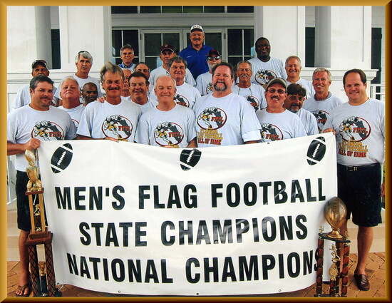 Lowell and team celebrating their induction into the Flag Football Hall of Fame.
