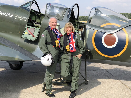 Lowell and Nancy flying Spitfires over England.
