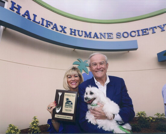 Lowell, Nancy, and Snowball recognized for giving $1M for Halifax Humane Society Lohman Pet Adoption Center in 2019.