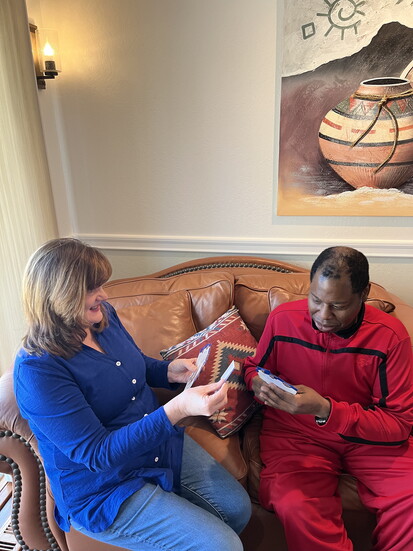 Maureen with a resident. Photo by Ellee Coleman