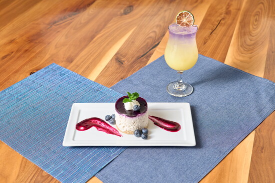 A No-Bake Blueberry Cheesecake with an oat crust & blueberry compote made at Cotton HOllow Kitche.