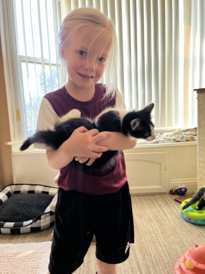 Susan's granddaughter, June, loves her new kitten friend.