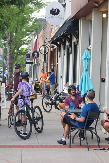 People gather in downtown Windsor for breakfast on Bike Everywhere Day.