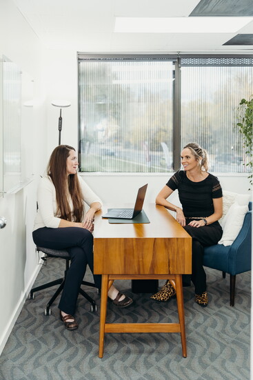 Anne Bowden with a potential client 