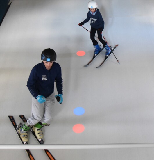An added ramp offers the opportunity to practice jumps and a projected ski course offers slalom practice. 