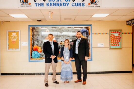 Robert Beers with Carly Pena, guidance counselor, and Aldo Russo, principal, at John F. Kennedy School 