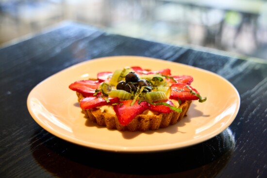 A berry tart is among the many house-made desserts at River. 