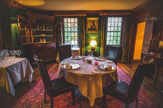 A cozy dining room at the Restaurant at Winvian Farm. Photo by Winter Caplanson