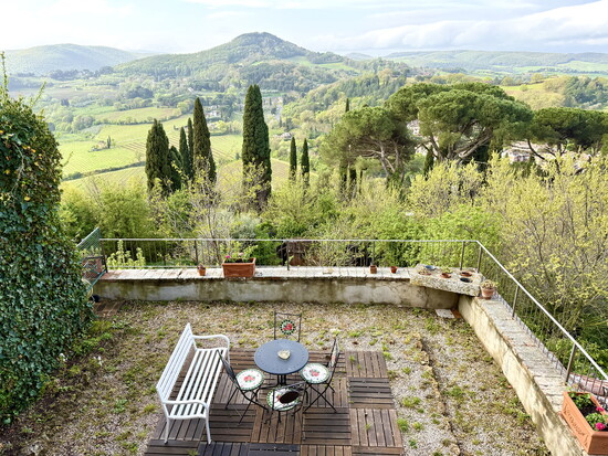 In Montepulciano, a garden terrace overlooking the Tuscan countryside.
