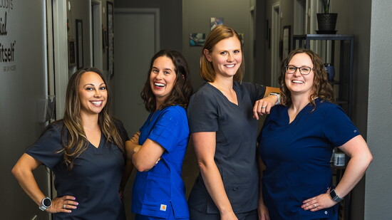 The New Beginnings team (L-R) Ashlee, Dr. Toni, Dr. Tiffany, and Jessica. Black Iron Photography.