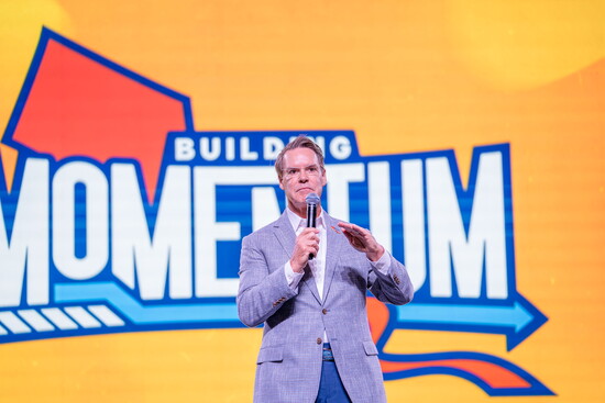 Patrick Lawler speaking at the employee conference