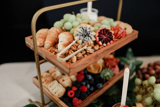 Rosemary & Brie designs artisanal cheeses, premium cured meats, and fresh seasonal accents.