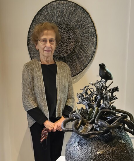 Norma with her artwork. Photo by Tom Grotta, owner of browngrotta arts.