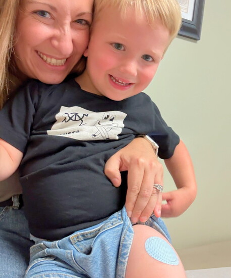 Nicole Doiron and her son Conor, showing off his Thimble Recover patch post-checkup.