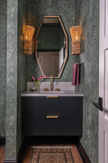 Homeowner Ashley Jones says the Modern Wood Wallpaper from York is "one of the most complimented spots in the house. I still smile every time I walk by it!"