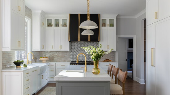 The focal point of the kitchen is the Modern Range Hood from Fittings Metal Collection