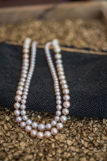 Graduated pink pearl necklace | $240. White and pink pearl necklace | $240 
