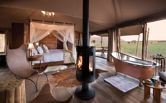 Steeped in the romance of old-world safari camps, One Nature Nyaraswiga sits at the heart of the Serengeti—where sweeping plains views, copper soaking tubs, 